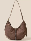 Brown suede hobo shoulder bag with braided center detail and tassel fringe
