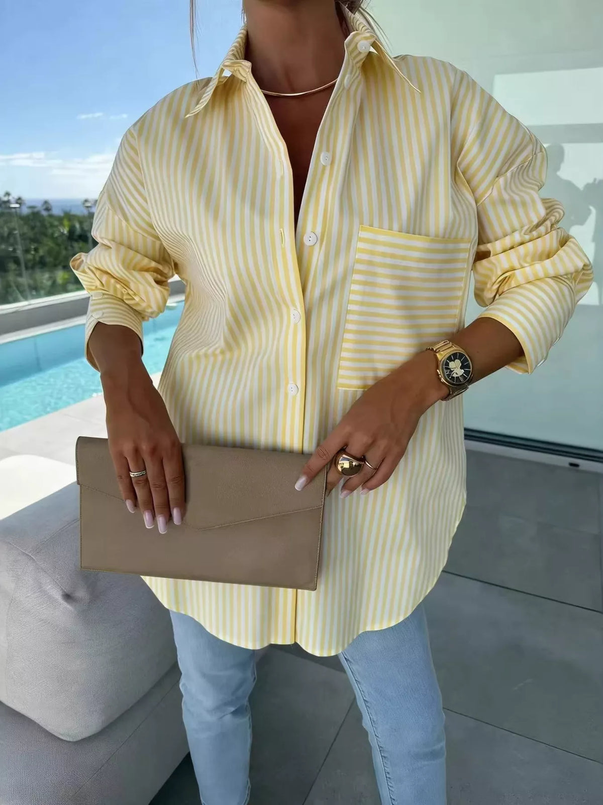 Yellow striped button-up long-sleeve stretch shirt with chest pocket and collared button front.
