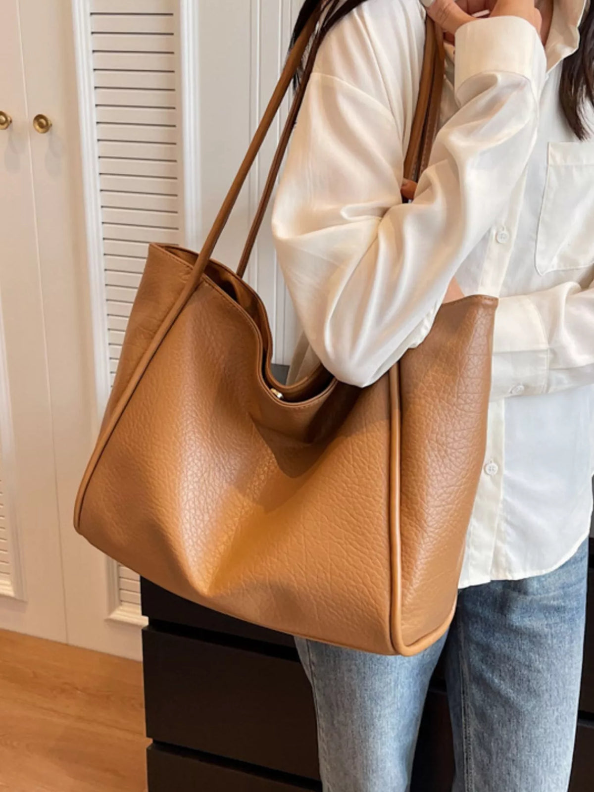 Khaki vegan leather tote bag with long shoulder straps and roomy open top
