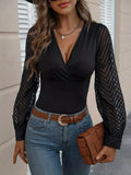 Black sheer chevron long-sleeve blouse with V-neck wrap front