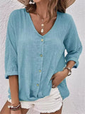 Blue V-neck button-front blouse with three-quarter sleeves, relaxed fit