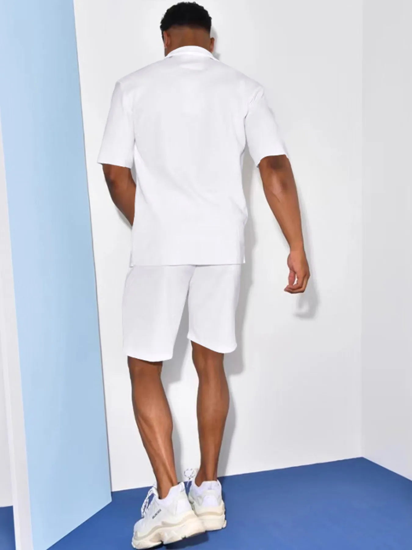 White button-up shirt and matching shorts set, back view with short sleeves