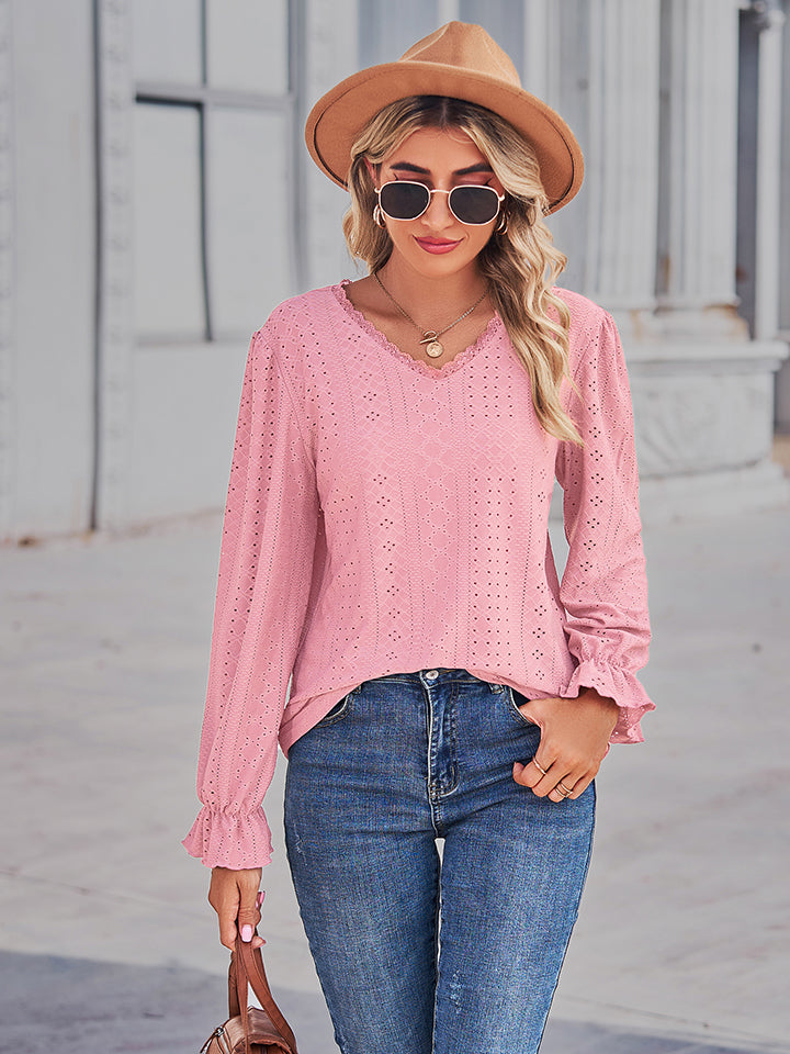 Blush pink eyelet V-neck blouse with flounce sleeves and gathered cuffs, front view