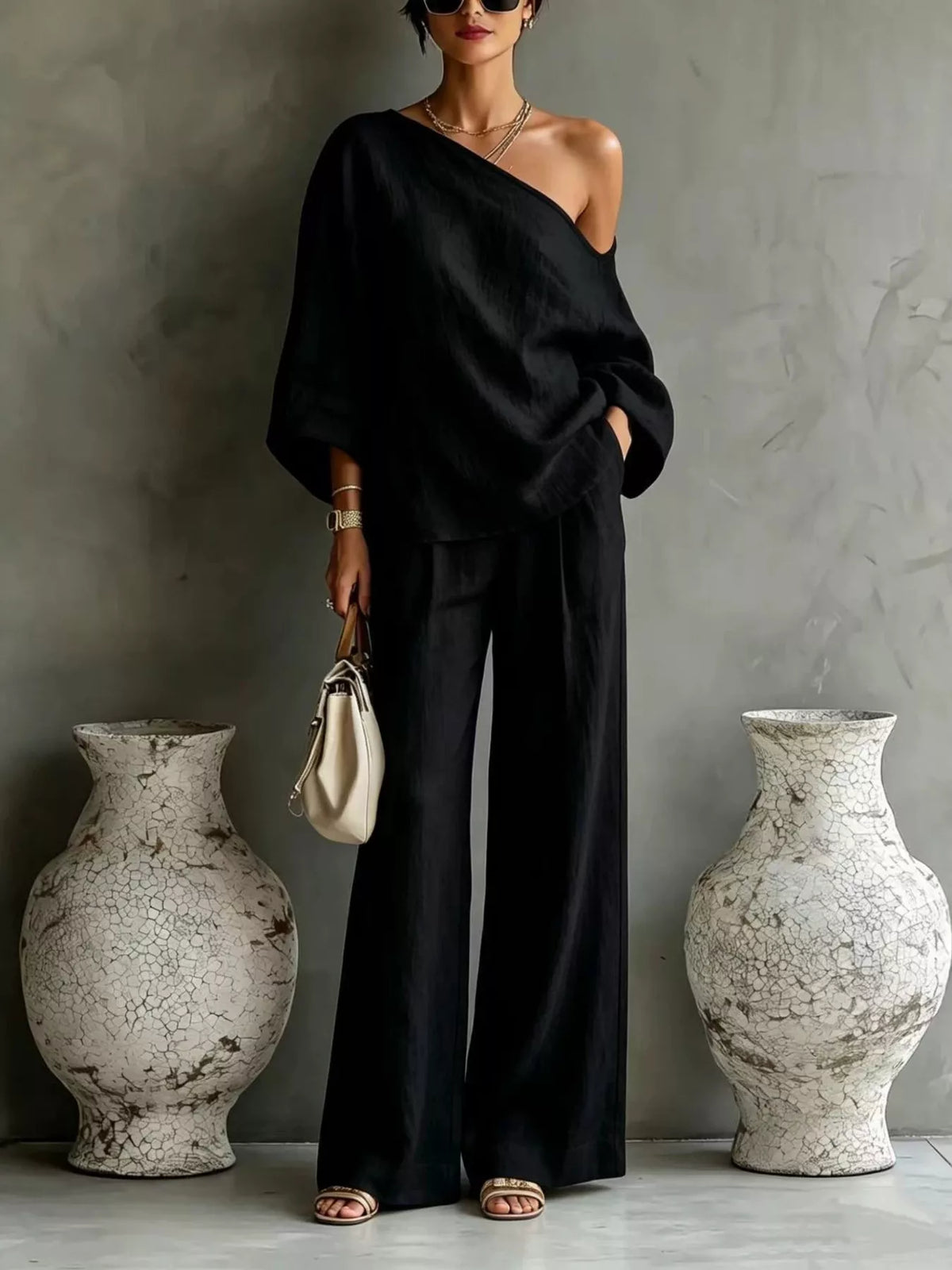 Black one-shoulder top and wide-leg pants set, relaxed fit