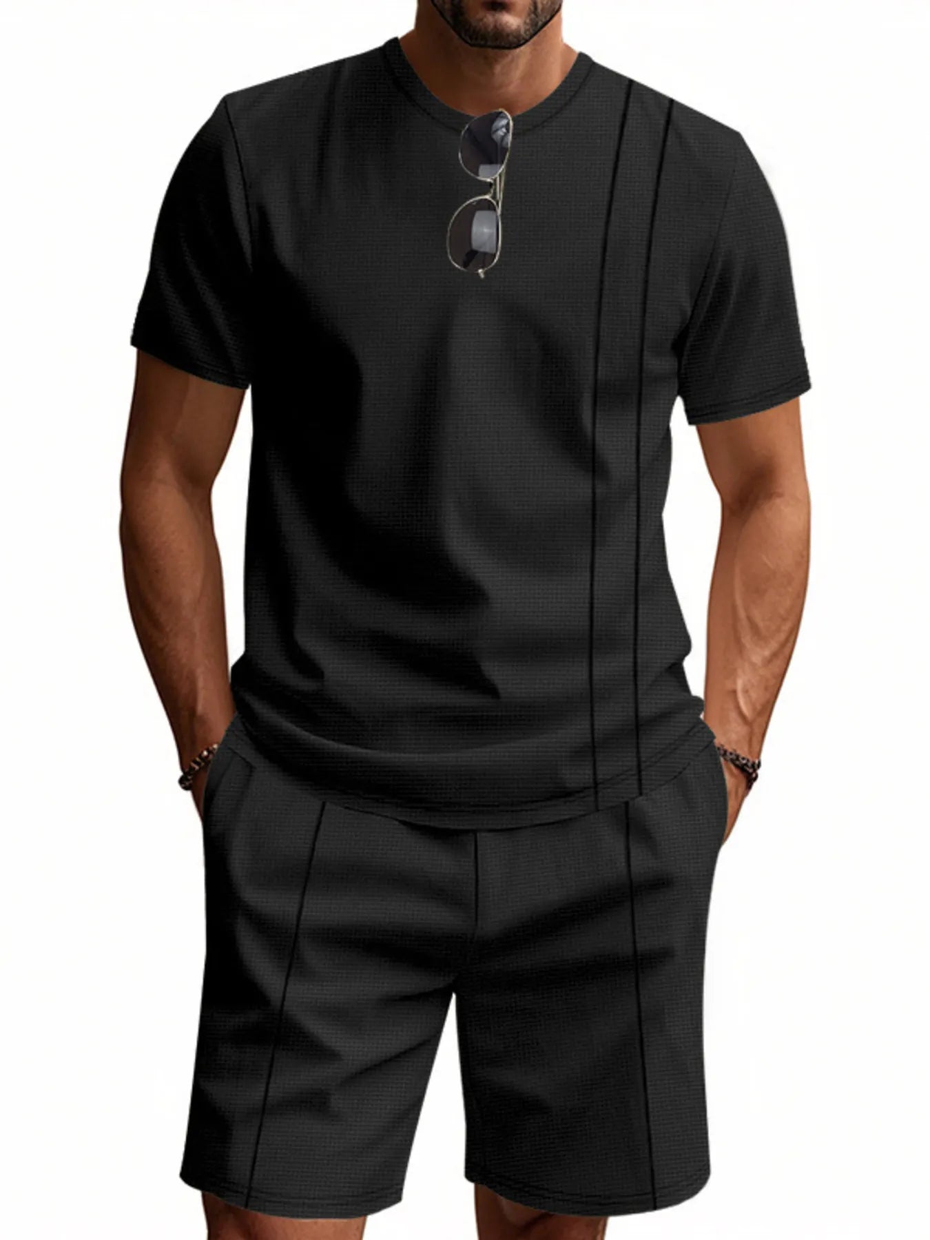 Men’s black short-sleeve round-neck T-shirt and matching shorts set, front view