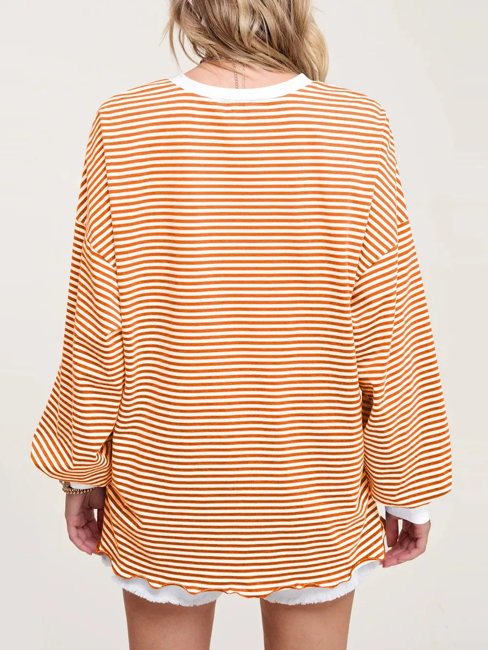 Contrast striped long-sleeve sweatshirt, orange neckline and orange-and-cream horizontal stripes