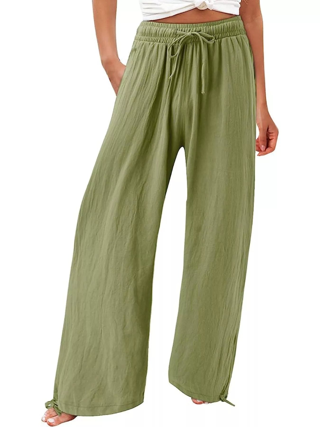 Olive green wide-leg pants with drawstring waist and loose, draped fit