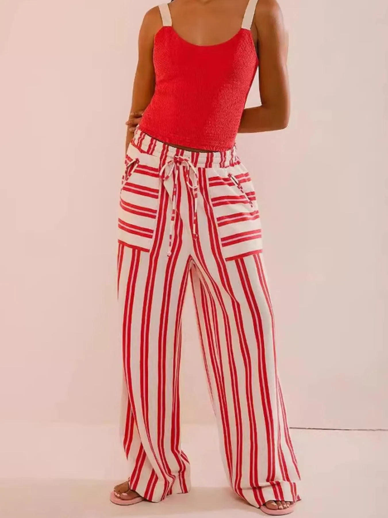 Wide-leg drawstring pants with red-and-white vertical stripes