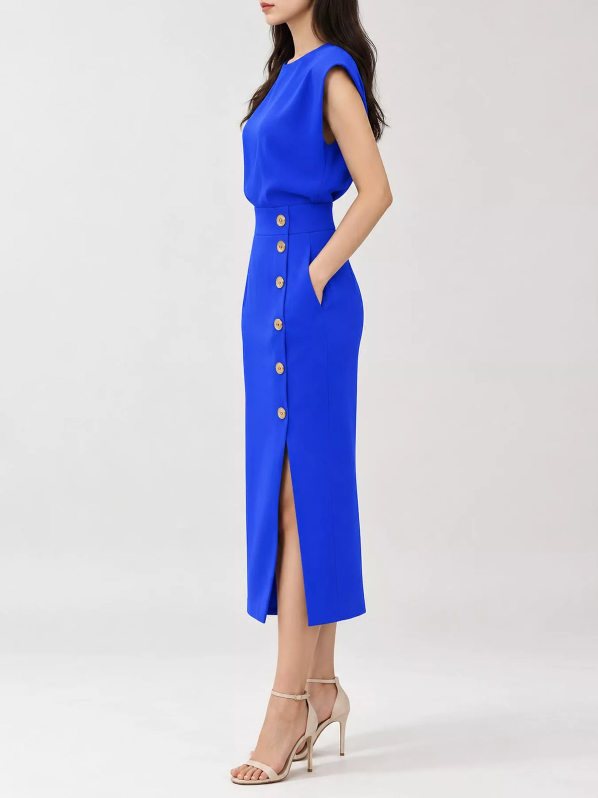Blue sleeveless midi dress with side slit and gold button trim at waist