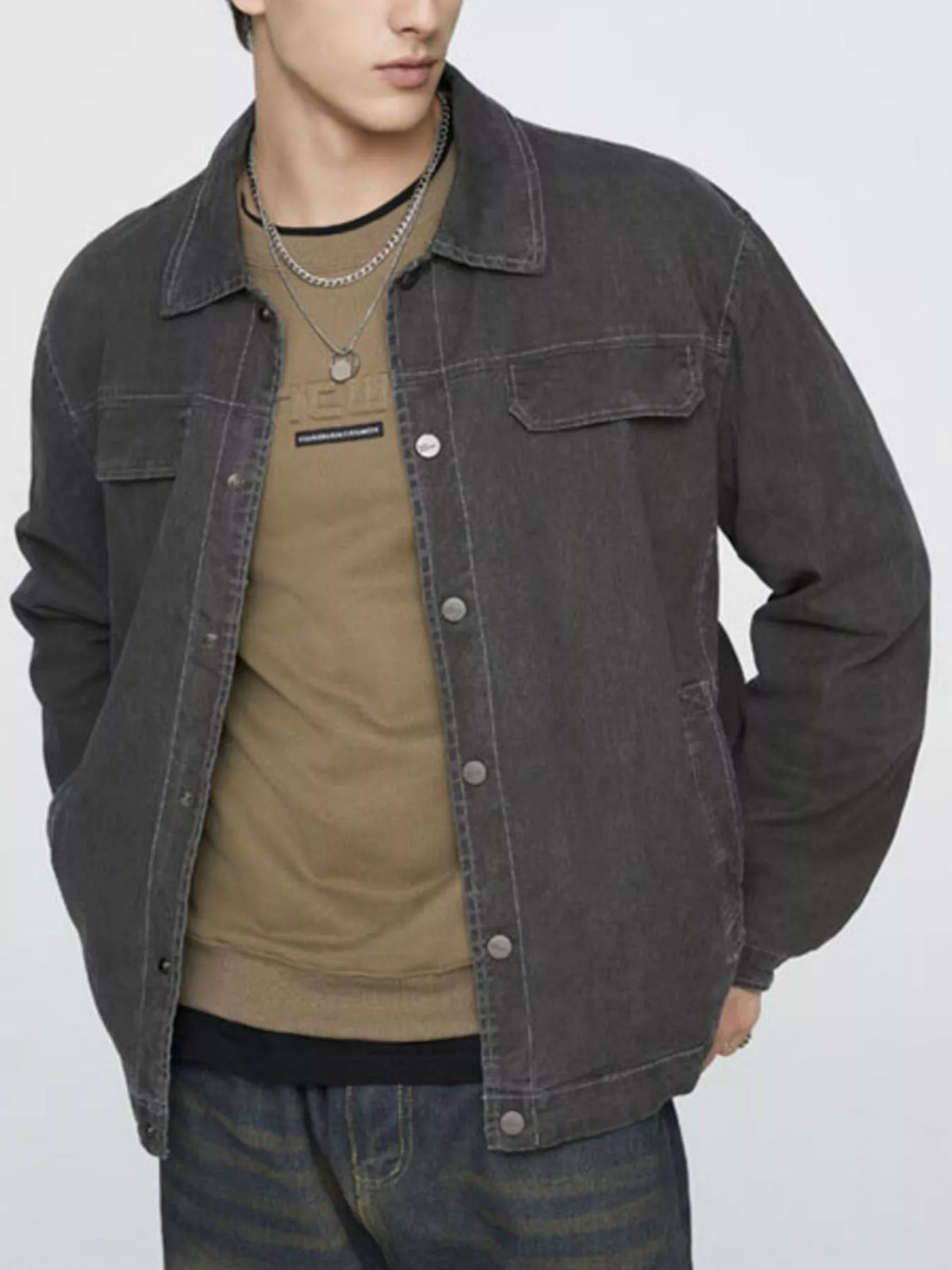 Men's gray cotton button-up jacket with chest pockets and snap-front placket