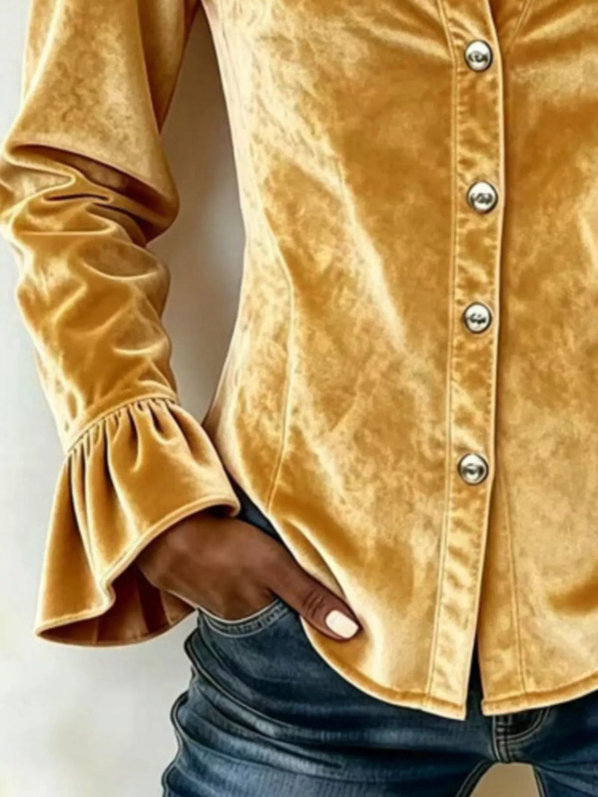 Gold velvet button-down top with ruffle sleeves and round button placket