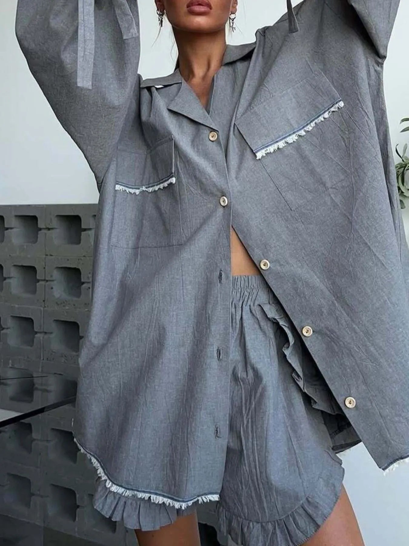 Dark gray button-up top with button front, ruffle trim, and matching shorts set
