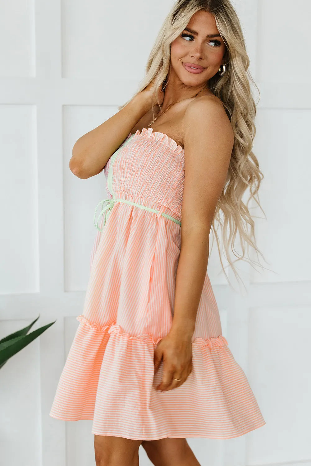 Dress: peach striped smocked tube mini dress, strapless with lime-green waist tie