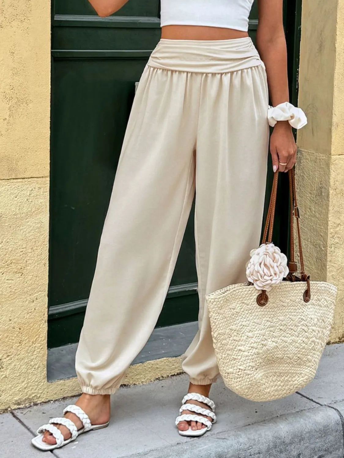 Cream high-waist joggers with ruched waistband and elastic ankle cuffs