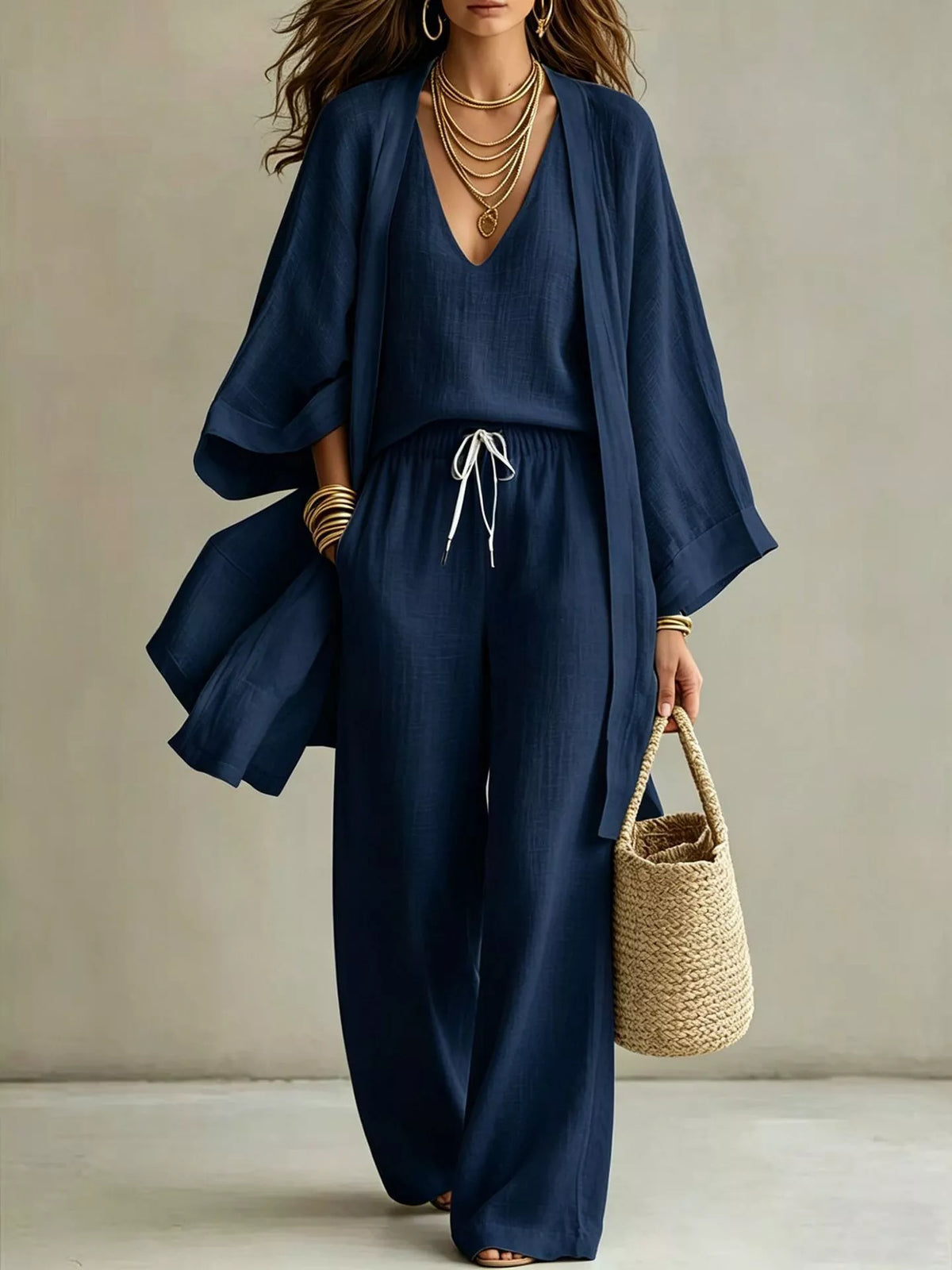 Three-piece outfit set in navy: V-neck top, drawstring wide-leg pants, open cardigan