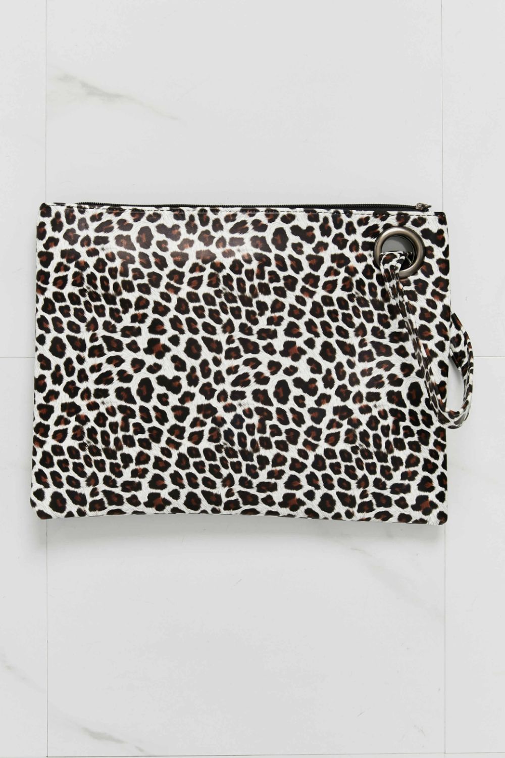 Leopard print wristlet pouch with zipper pull and metal ring