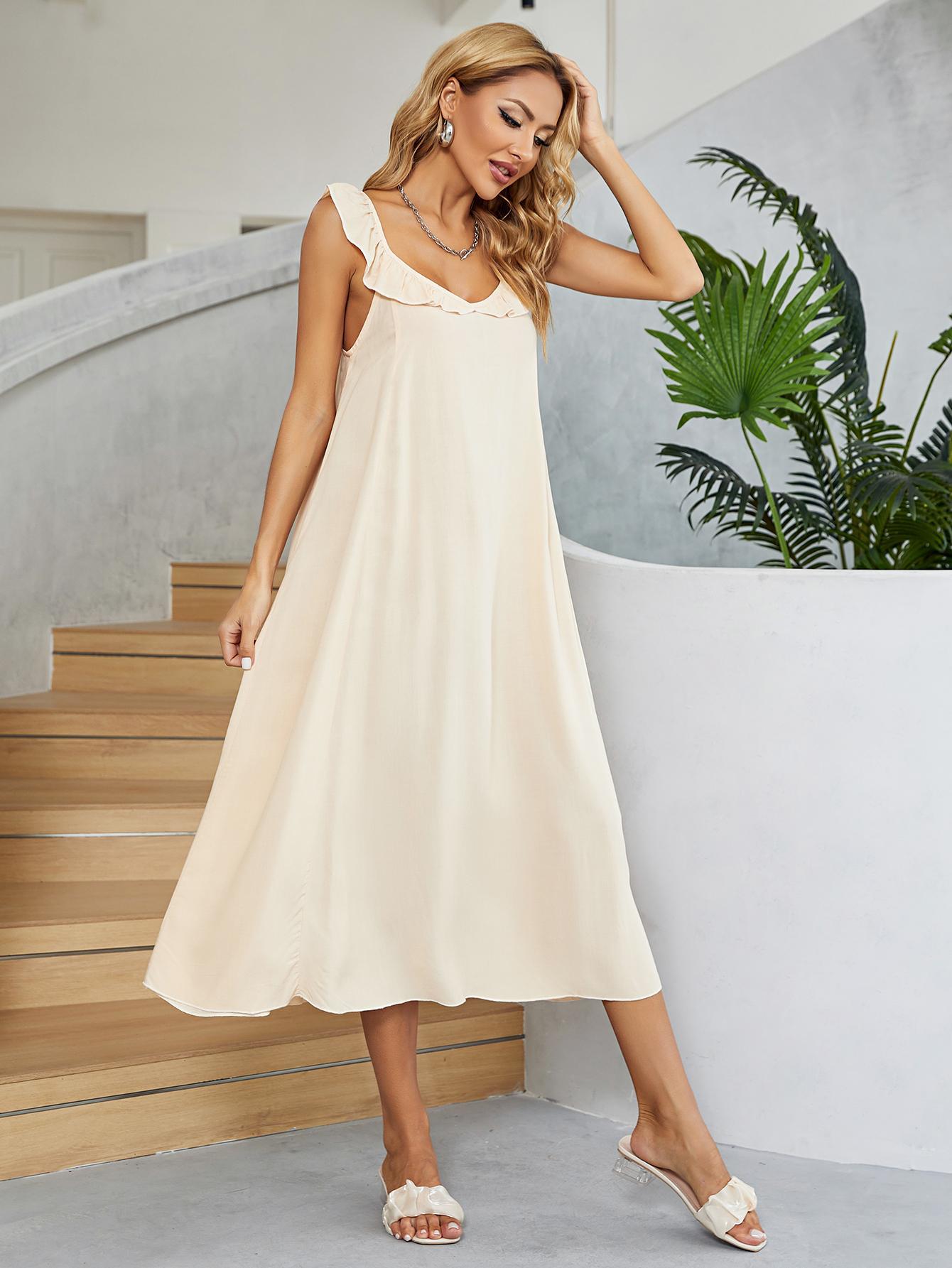 Cream ruffled midi dress with V-neckline and scalloped ruffle trim, sleeveless