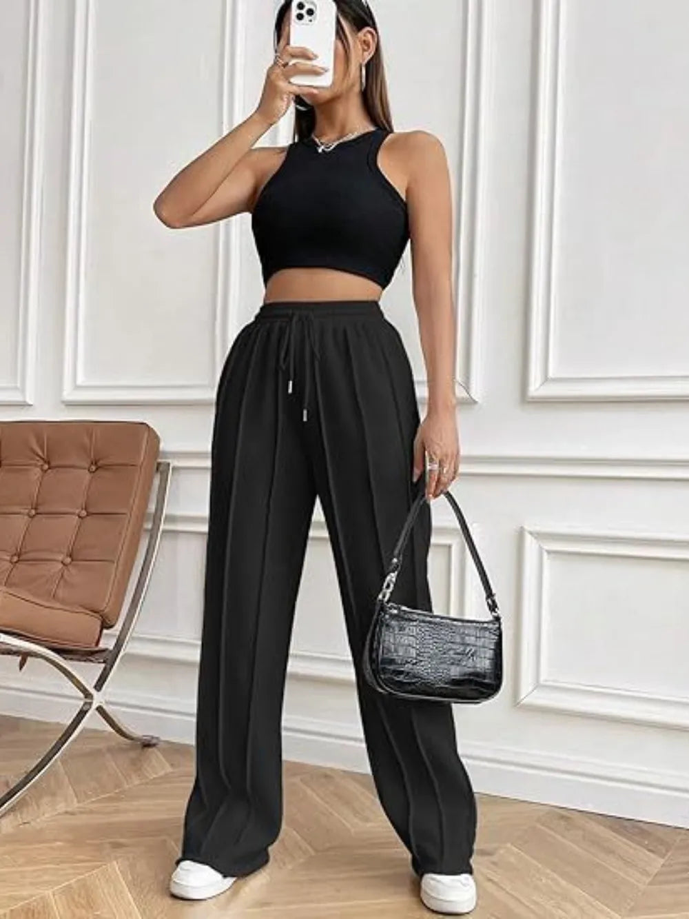 Black wide-leg pants with drawstring waistband and side pockets