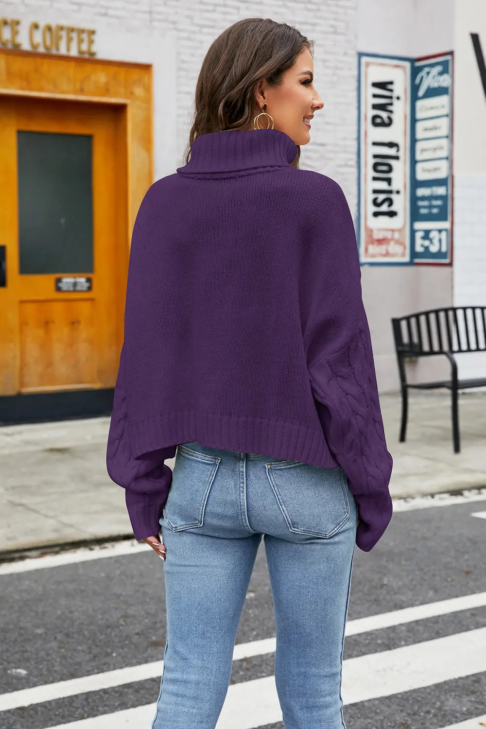 Plum cable-knit turtleneck sweater, long sleeves, shown from the back