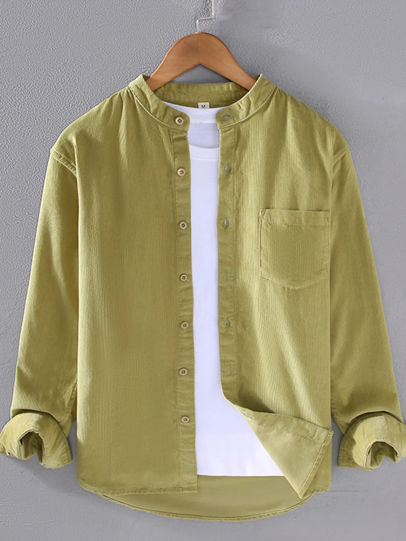 Men's long-sleeve button-up shirt in matcha green, with front buttons and chest pocket
