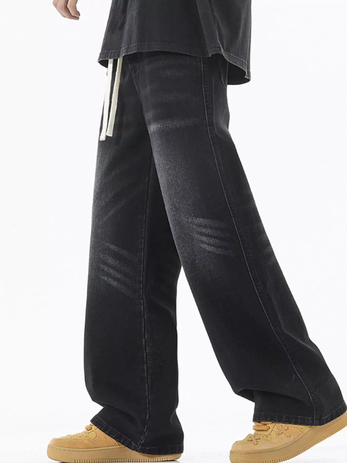 Men's black wide-leg jeans with white drawstring waist and side pockets