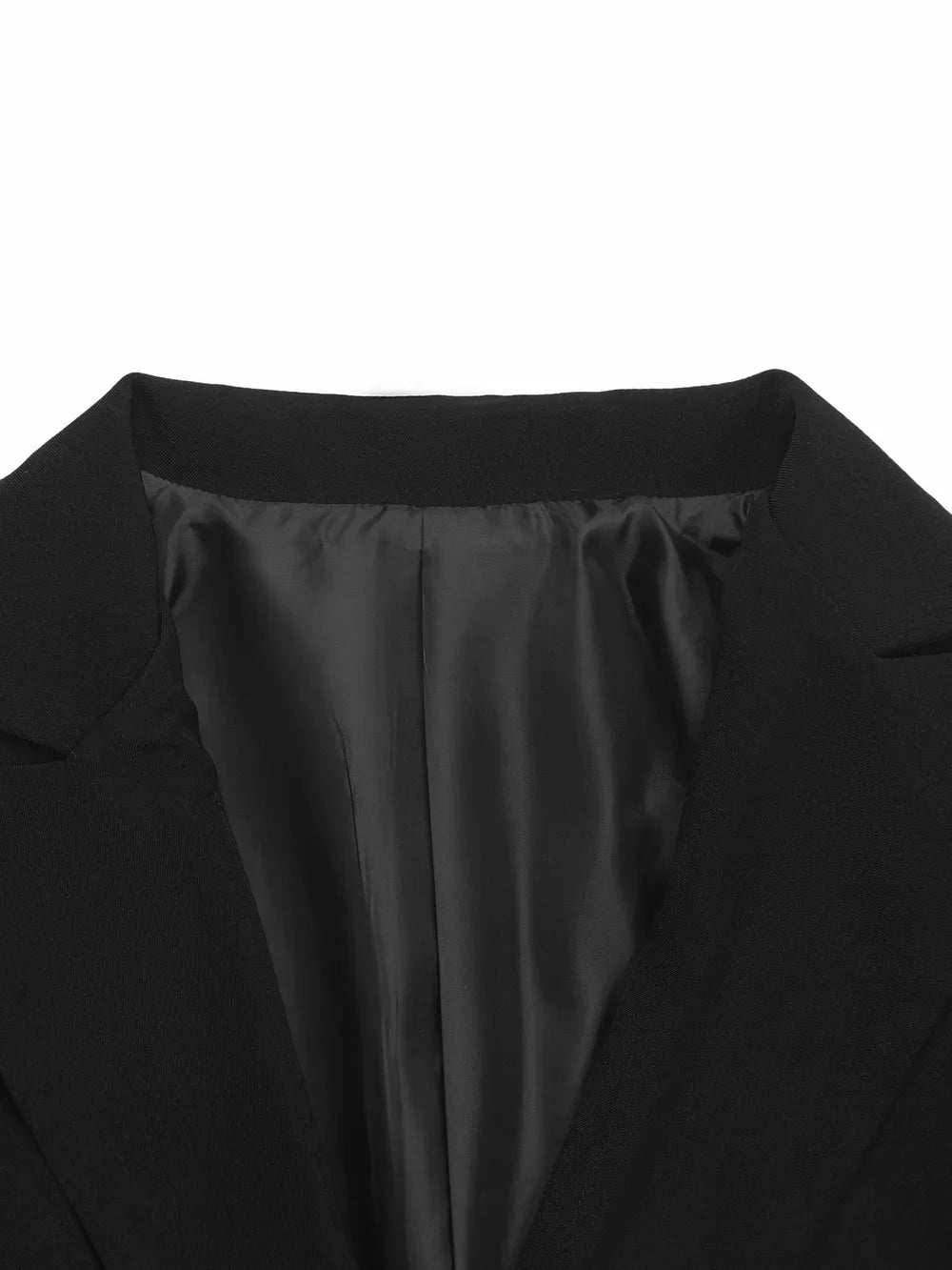 Black blazer yoke and pleated back panel under wide back collar