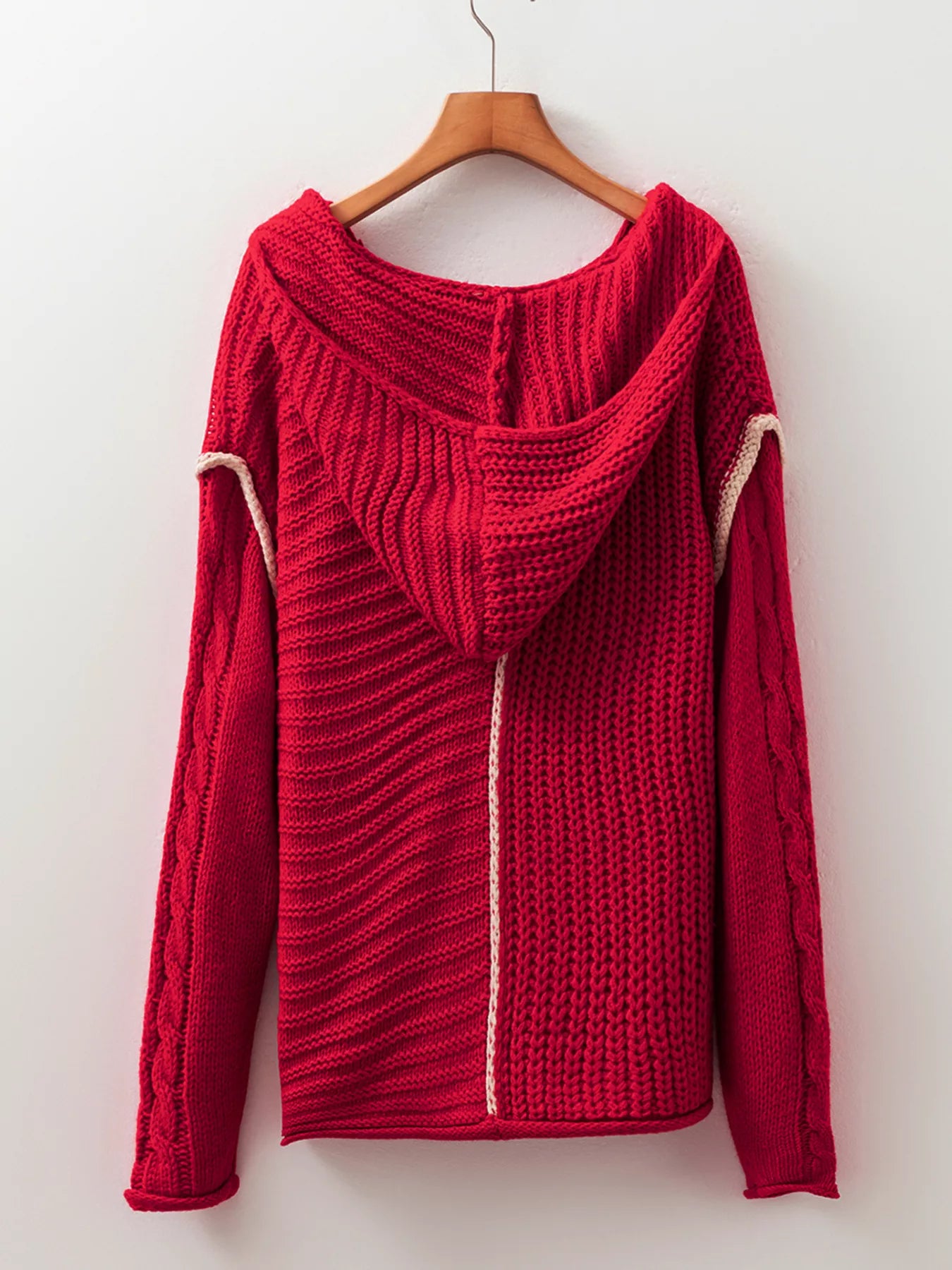 Deep red hooded sweater on hanger with white contrast trim and drawstring hood