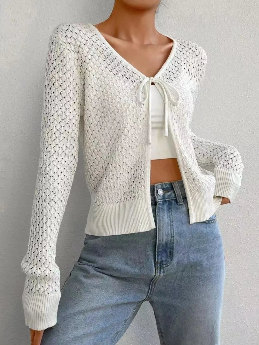 White openwork knit V-neck long sleeve cardigan with tie-front bow