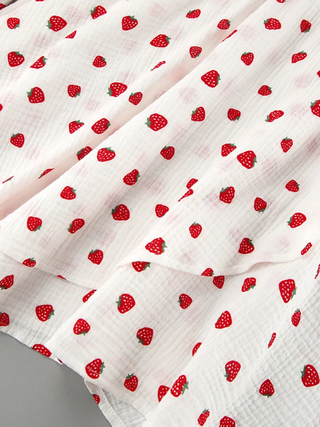 Strawberry print long-sleeve mini dress fabric on white with red berries