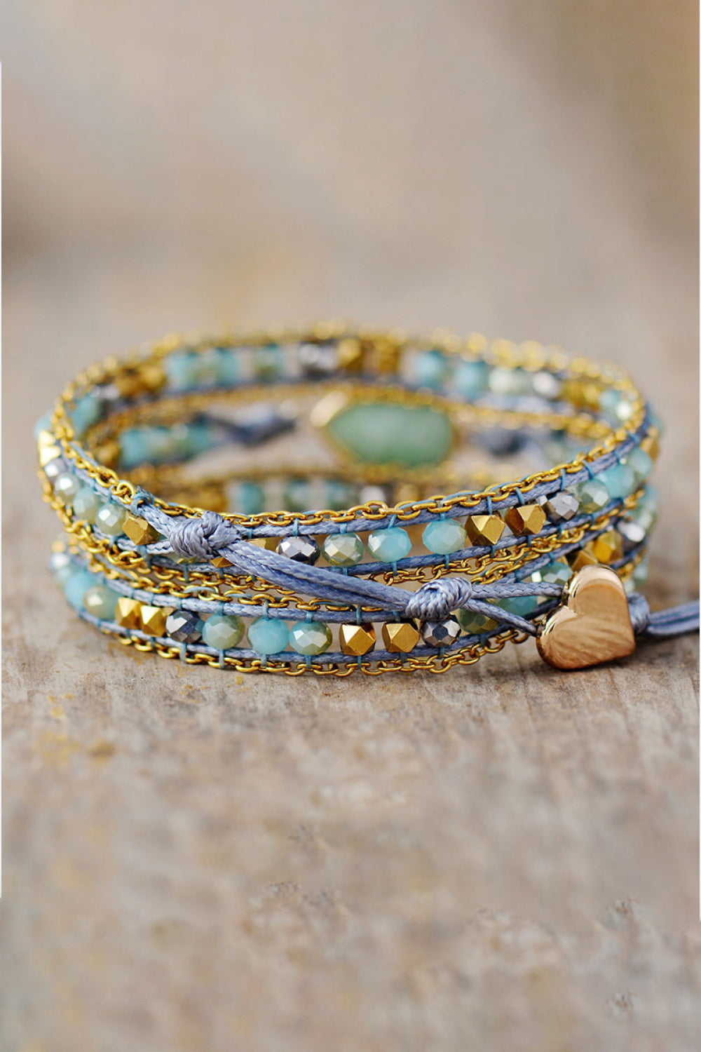 Aqua triple-layer beaded bracelet with teardrop pendant and button clasp