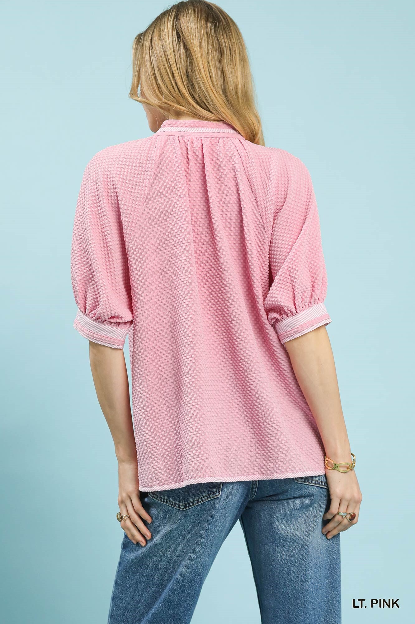 Cedar & Moore Umgee Textured Jacquard Contrast Trim Top in pink with white cuff trim, back view.