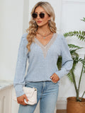 Misty blue ribbed knit blouse with lace V-neck trim and long sleeves