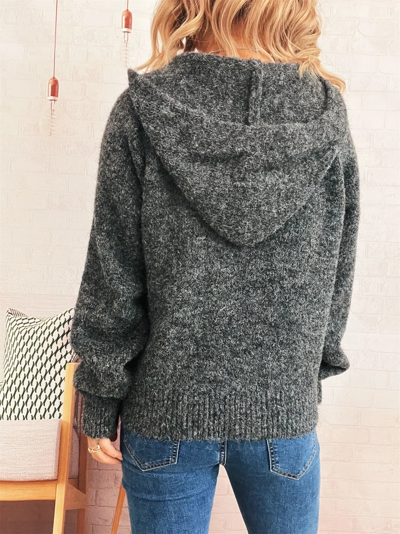 Dark gray quarter-zip knit sweater, back view with ribbed hem and cuffs
