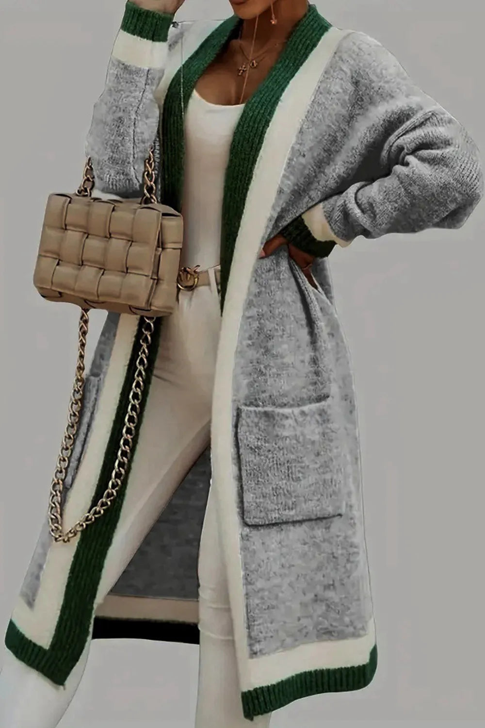 Heavily textured long cardigan with hood and green contrast stripe trim on gray
