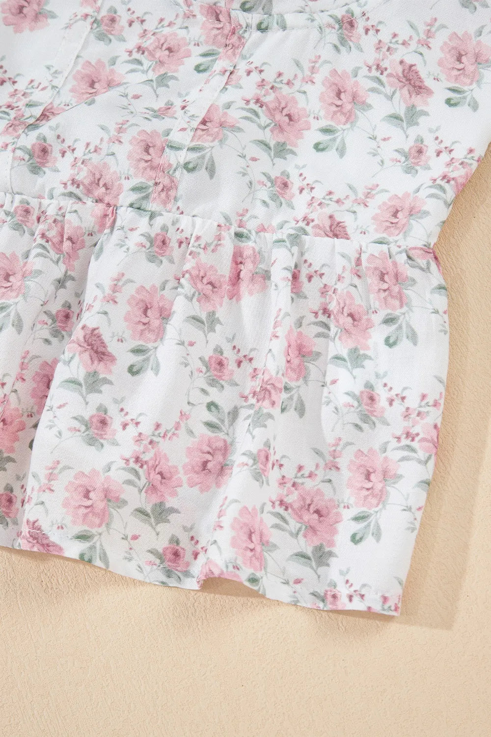 Floral flutter peplum tank top with elastic smocked bodice