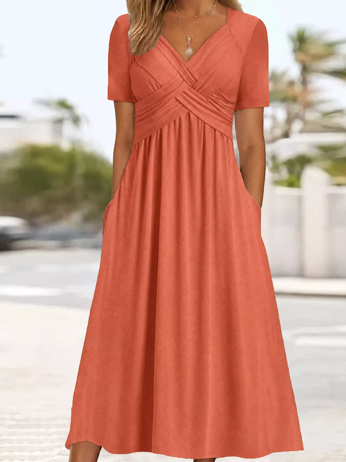 Coral crisscross high-waist midi dress with short sleeves and V-neck