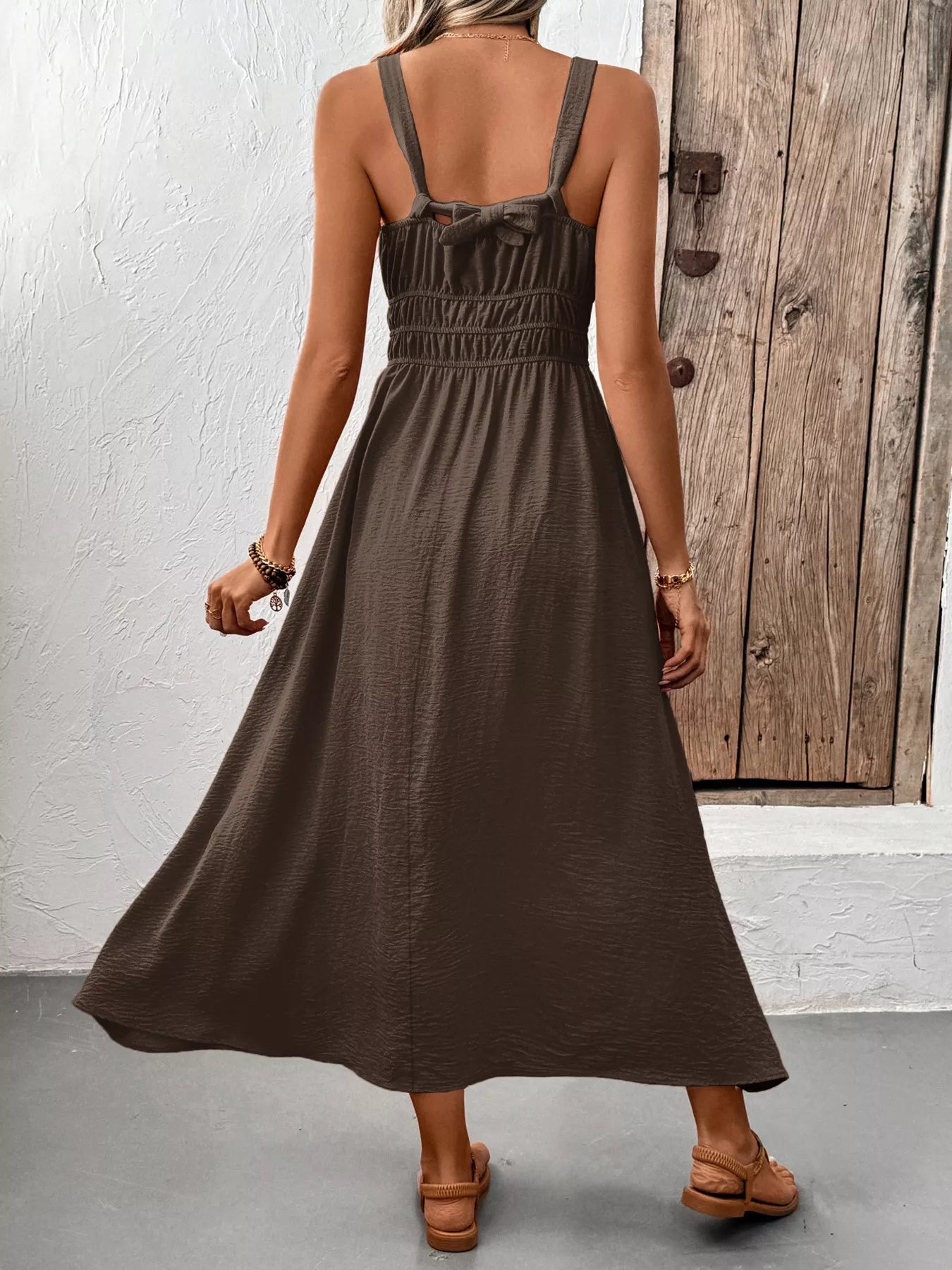 Cedar & Moore sleeveless taupe smocked midi dress with wide straps, back bow, flowy skirt
