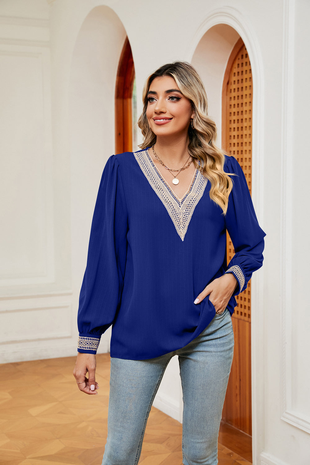 Royal blue contrast V-neck puff sleeve blouse with embroidered trim