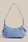 Dusty blue shoulder bag with double front pockets and curved hobo shape