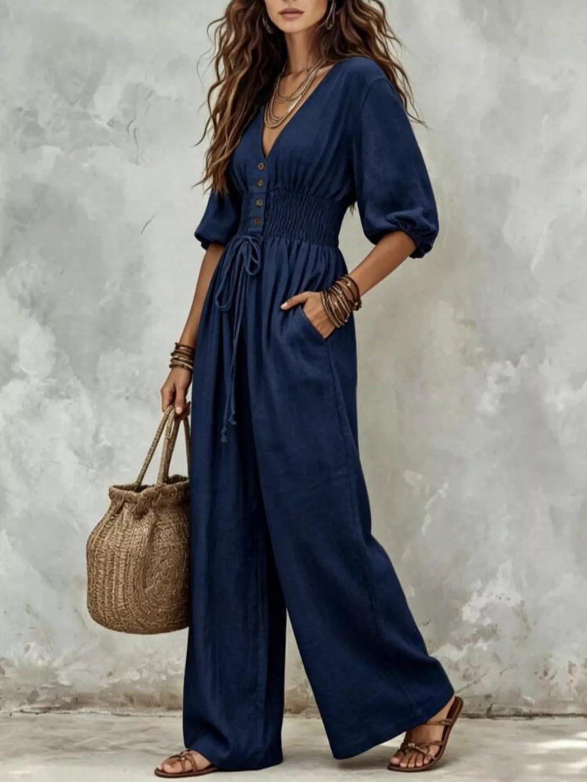 Navy v-neck smocked-waist wide-leg jumpsuit with drawstring waist and side pockets