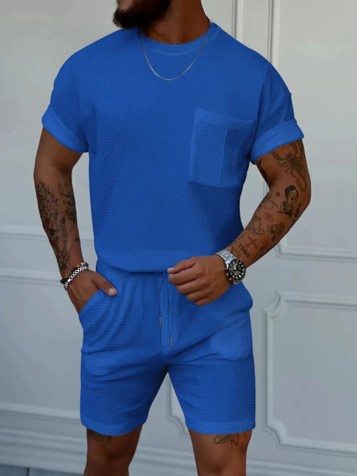 Men's royal blue short-sleeve round-neck top and shorts set with chest pocket