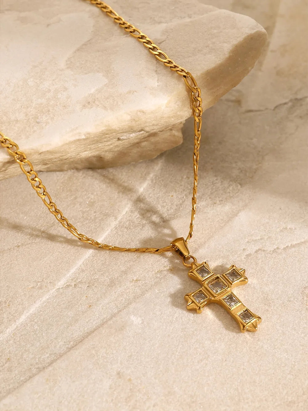 Gold-tone cross pendant necklace with square zircon-studded front