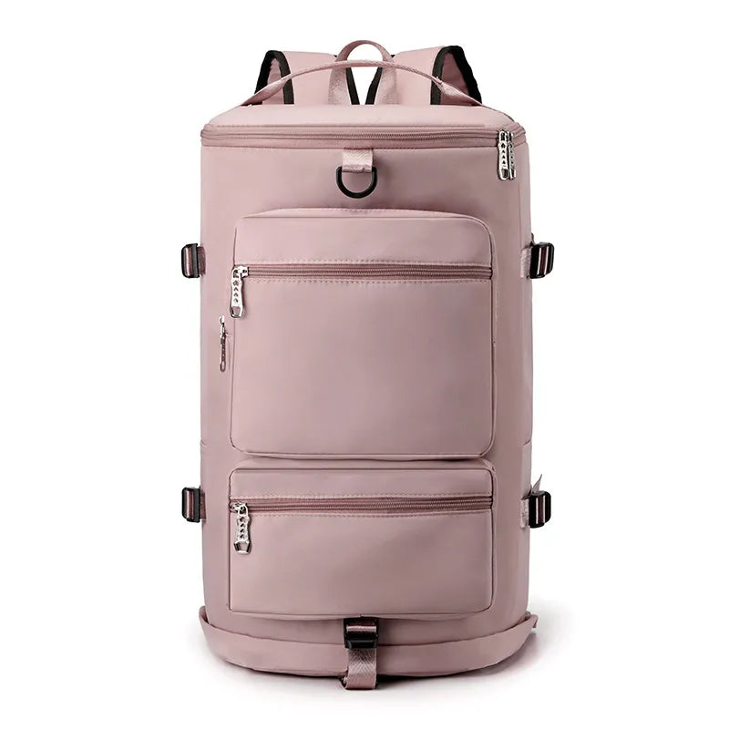 Large travel backpack with two front zip pockets and top handle, dusty pink