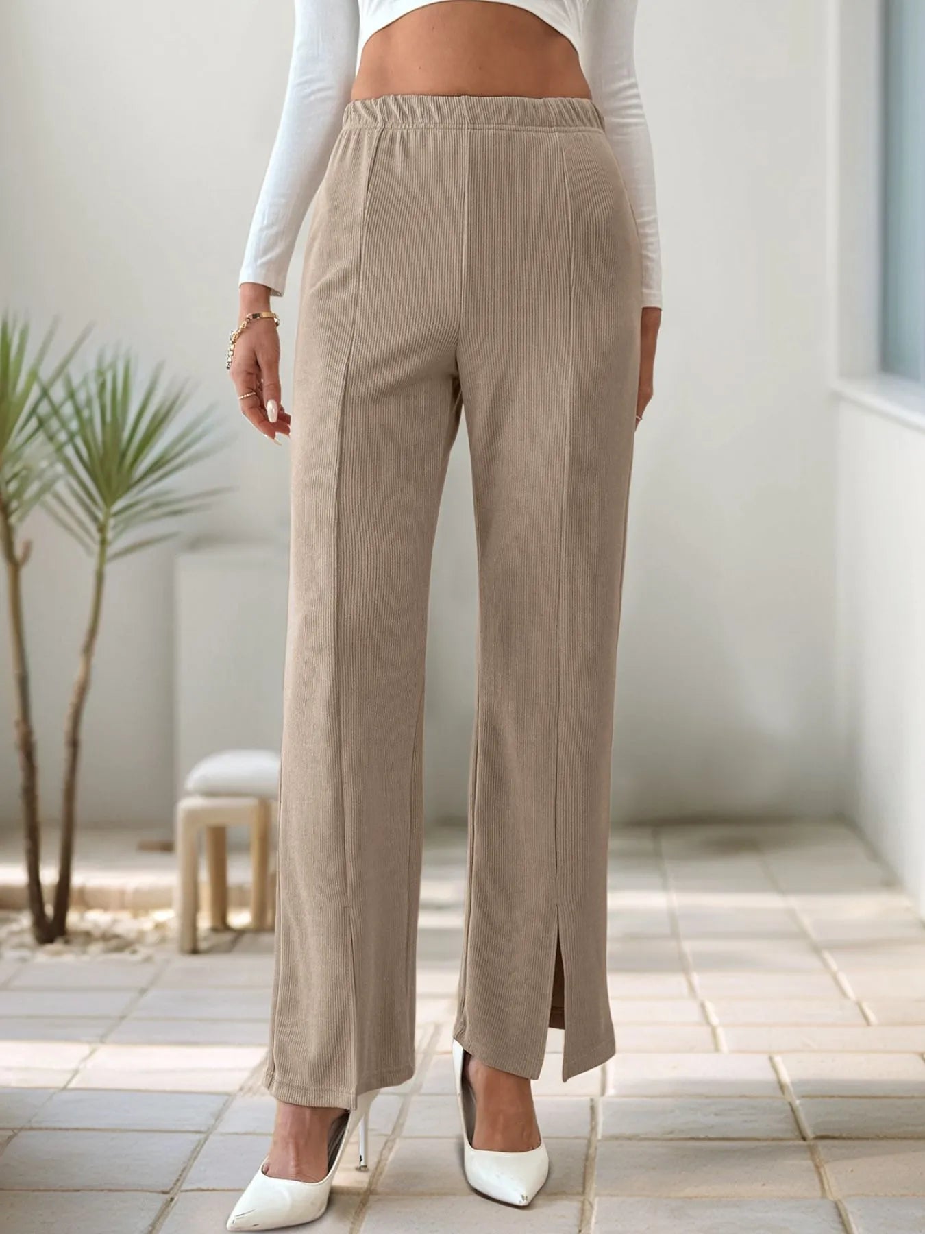 Khaki high-waisted wide-leg pants with elastic waistband and long front slit