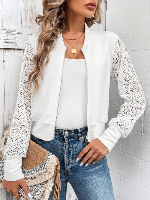 White zip-front jacket with lace sleeve panels and baseball collar