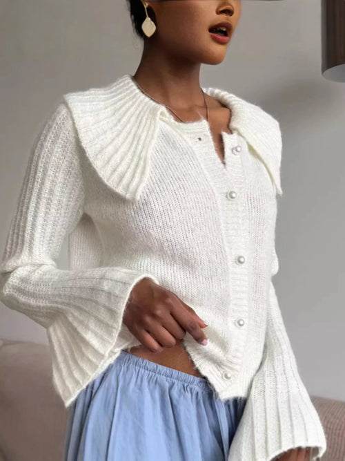 White button-up cardigan with ribbed flare sleeves and button front