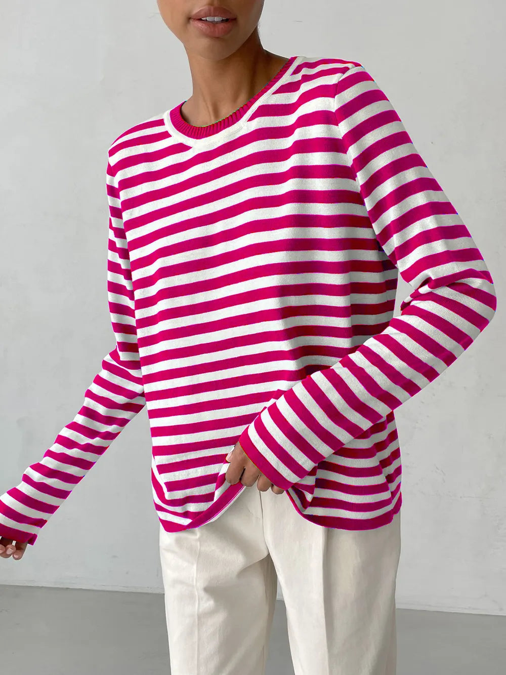 Striped long-sleeve sweater in pink and white with crew round neck.
