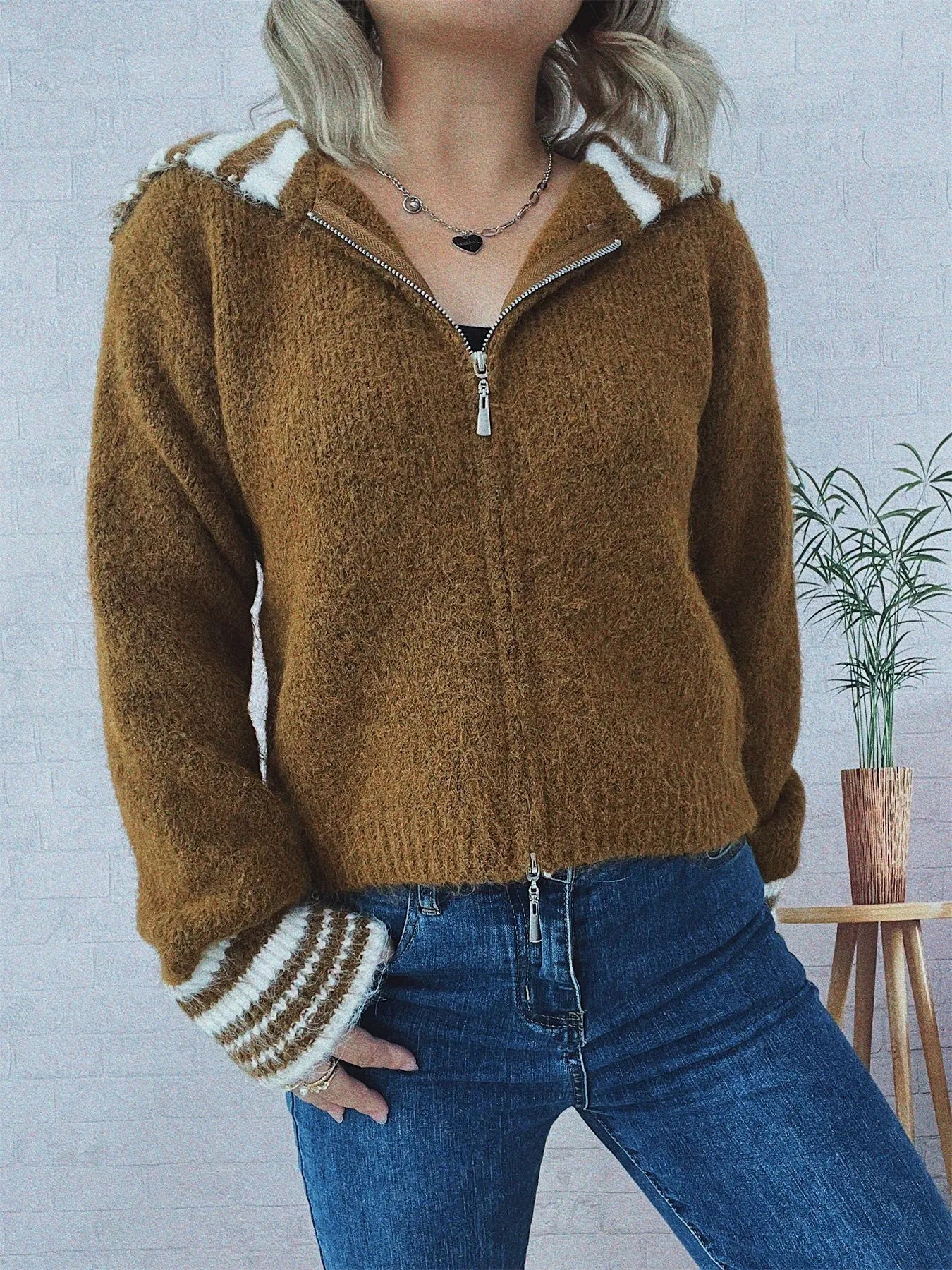 Brown zip-up cardigan with striped hood trim and ribbed cuff bands