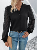 Black V-neck button-front blouse with sheer mesh long sleeves and fitted cuffs