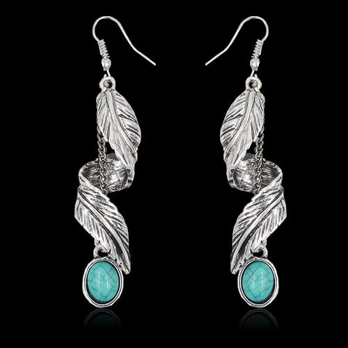 Silver leaf drop earrings with turquoise oval cabochons and chain accents